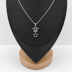 Collar baño de plata con colgante de estrellas
